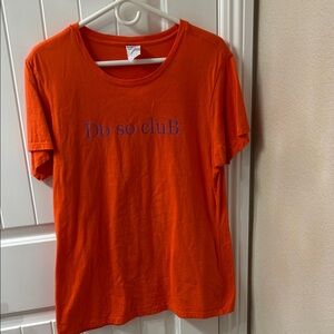 Port and Company Vibrant Orange Tee with Purple Text